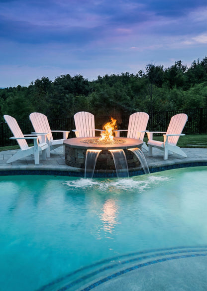 Round paver fire pit with a Warming Trends gas insert kit near a pool